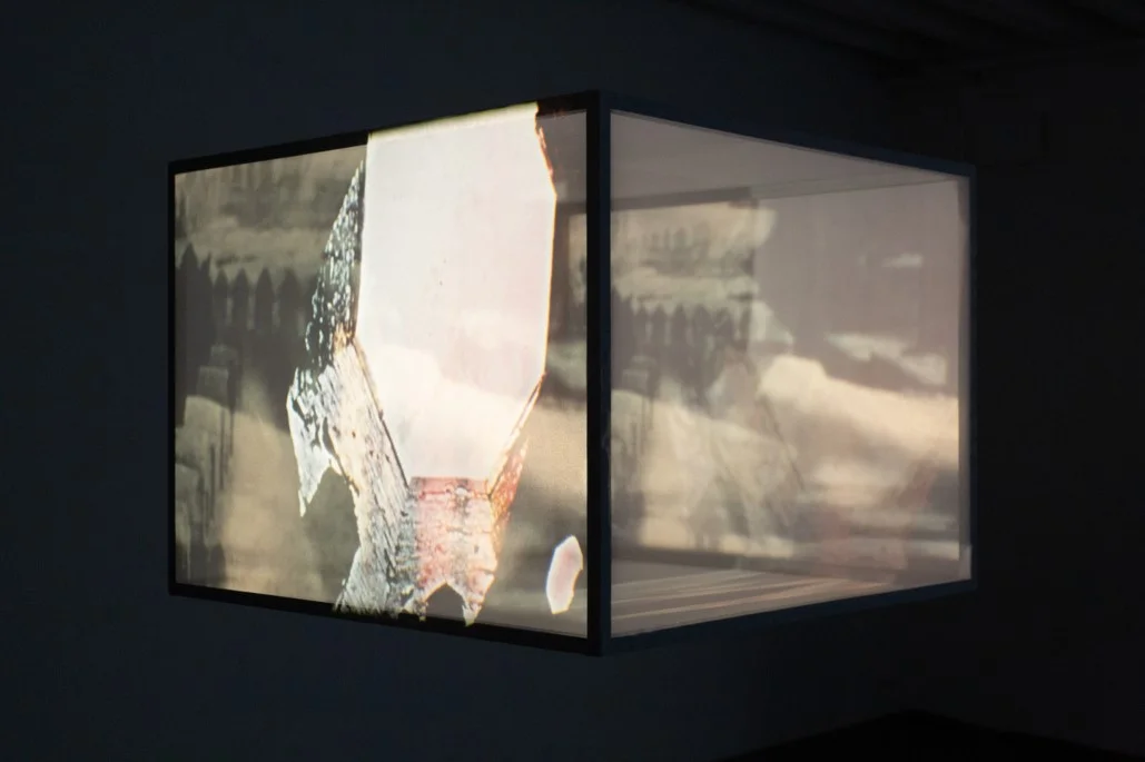 Galvanoscope, 2018, Projector, 16 mm film, wood, 3 min screen time on loop. 58,4 x 78,7 x 78,7 cm
